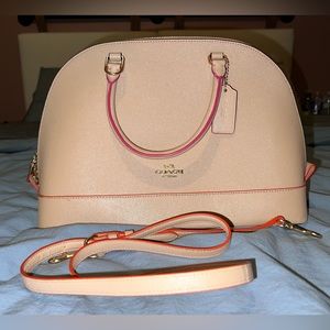 Nude pink orange Coach purse